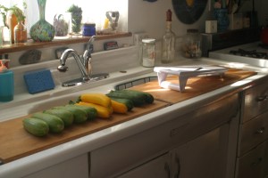 Houseproud homestead kitchen - summer squash ready to be sliced for simple salads.