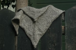 A toasty warm "kerchief", knit in stockinette, and increased in the center.