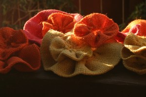 Work in progress - a pile of burlap flowers, waiting to be assembled.