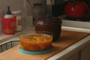 Roasted beets in chicken stock, and the earthenware pot in which I baked 'em.