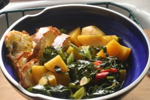 Beets roasted in chicken broth, with chopped kale and roasted red jalapenos.  Add some rather stale bread (which has been drizzled with olive oil), and you have a warming soup to nosh on.