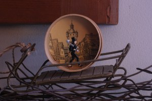 The Germans consider chimney sweeps symbols of good luck for the coming new year.  Here's a link to an article explaining the custom, via Bella Online (http://www.bellaonline.com/articles/art18309.asp).  We have two good luck sweeps - this one and another one (both purchased at Jutta's Flowers on Claremont Avenue in Berkeley).  These little guys will stay out until the end of January, long after the Christmas ornaments have been put away (I don't put them out on display until the day after Christmas).