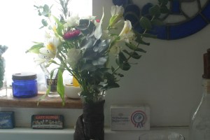 I recently started placing small flower arrangements in the Houseproud homestead's kitchen.  These are from my favorite flower shop, Dandelion (on Park Street here in Alameda).  The owner, Karim, has such a lovely eye for color and design - she and her shop are such an inspiration to me.  She started off selling lovely little arrangements like these at shops around Alameda, then took the plunge and opened a shop of her own.  She's sweet and lovely and brave as ten thousand lions.