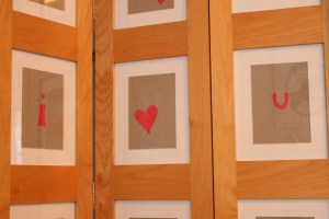 The screen spells out the Mister's name and my name (vertically), with a column of hearts separating our two names.  It wasn't until I put the screen together that I noticed that the "i" in the Mister's name & the "u" in my name were connected by a heart to spell out "i (heart) u".  Ain't that something?  Yes, yes, yes, I know, I need a life, but still, that's pretty darn cool ...